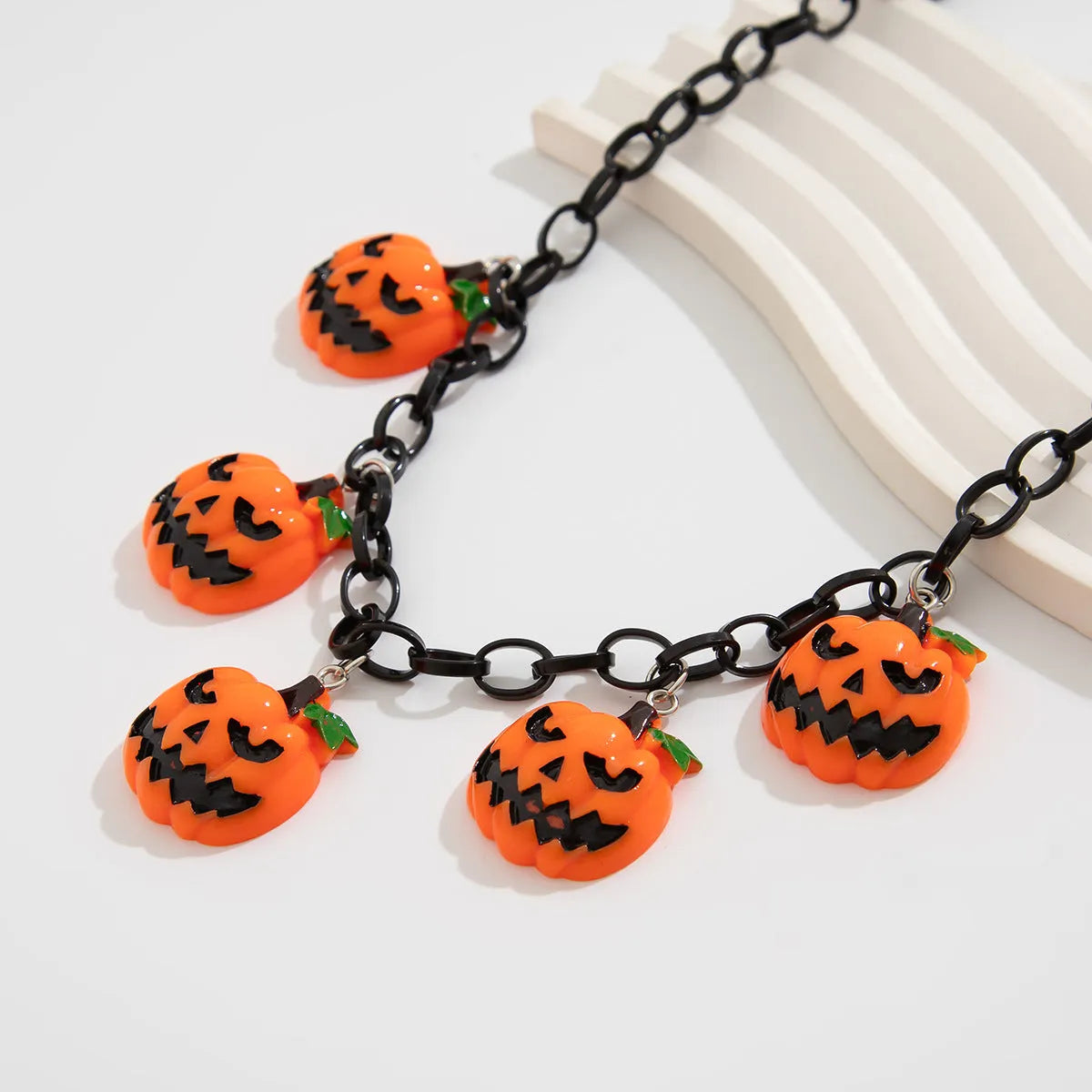 Halloween necklace with acrylic pumpkin ghost pendant on plastic chain in mixed colours
