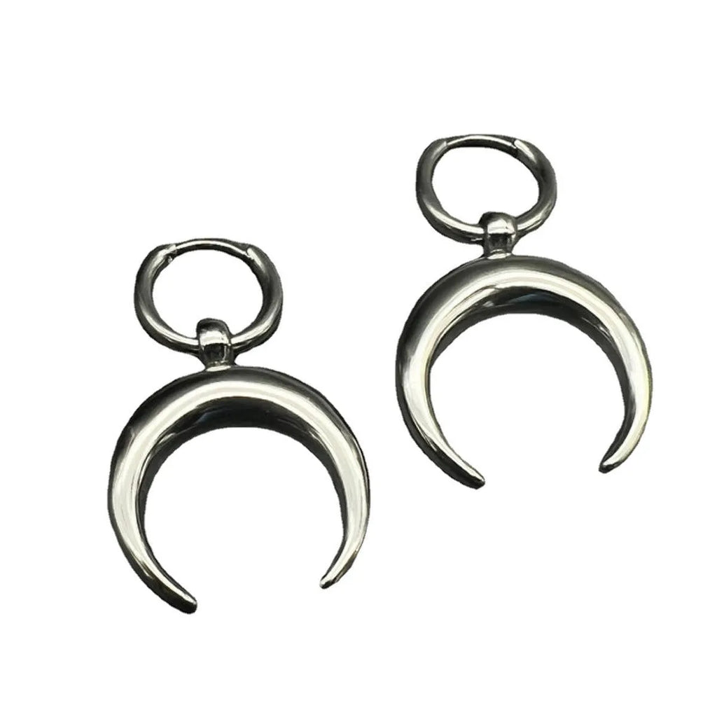 Silver geometric hoop earrings with moon motifs and ear clip fastening
