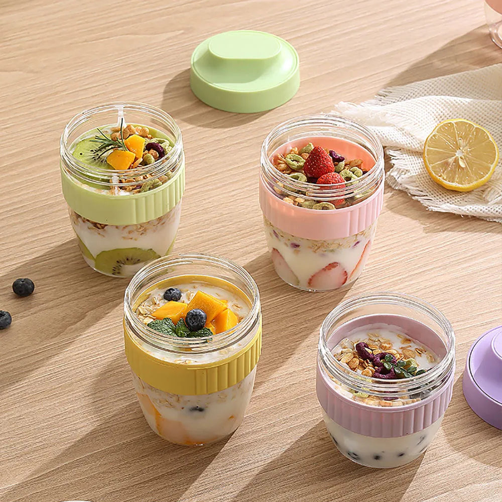 Green plastic salad cup with integrated spoon and lid showing seal and leak-proof design