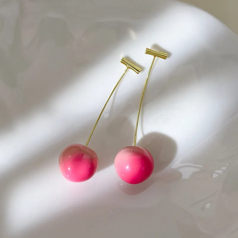 Acrylic peach fruit earrings with copper wires in small and large peach designs