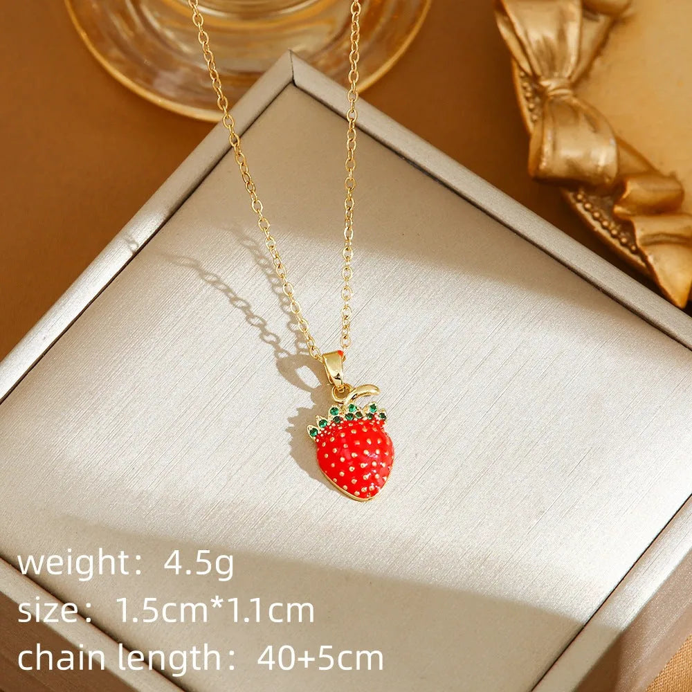 Women's titanium steel necklace with detailed pepper, strawberry and cherry pendants on O-ring chain