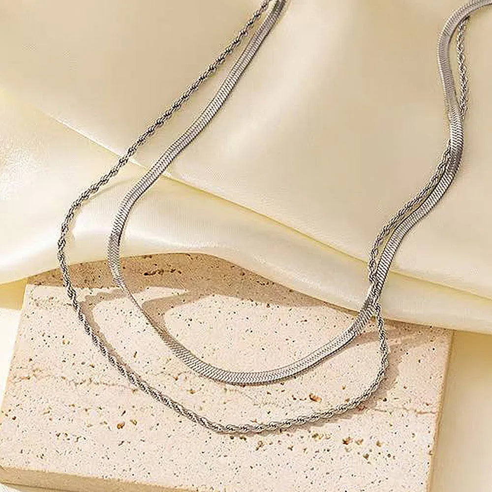 Women's adjustable double-layer twist necklace with geometric titanium steel pendant on snake bones chain