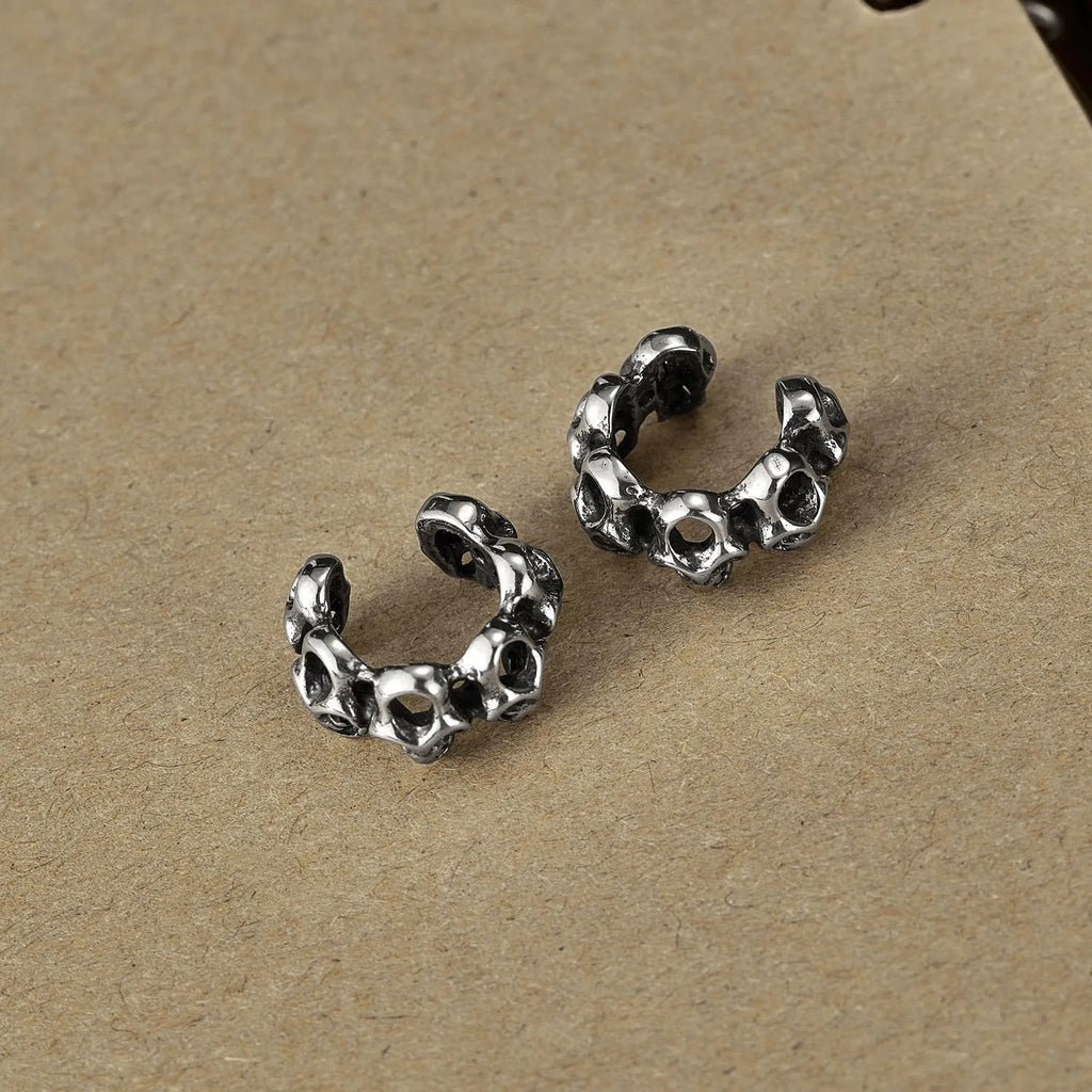 Retro hollow skull stainless steel ear clip earrings for men and women