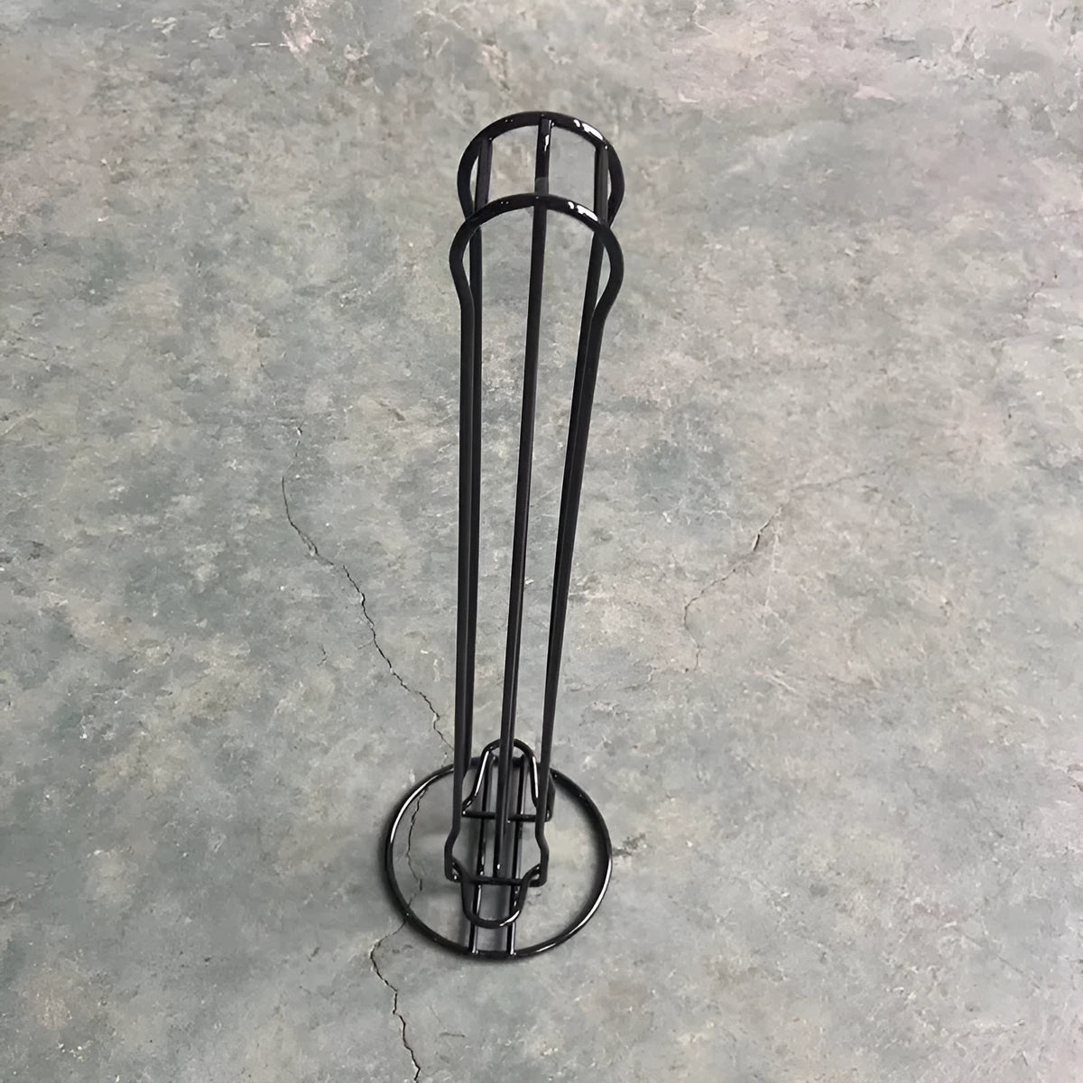 Wrought iron coffee capsule storage rack holding 20 pods with modern simple design