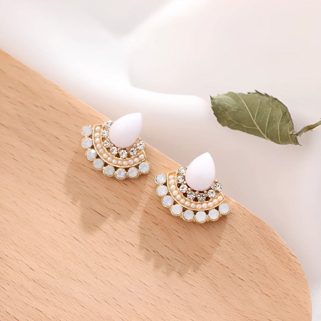 Women's silver retro fan-shaped earrings with opal centre and rhinestone detailing on geometric design