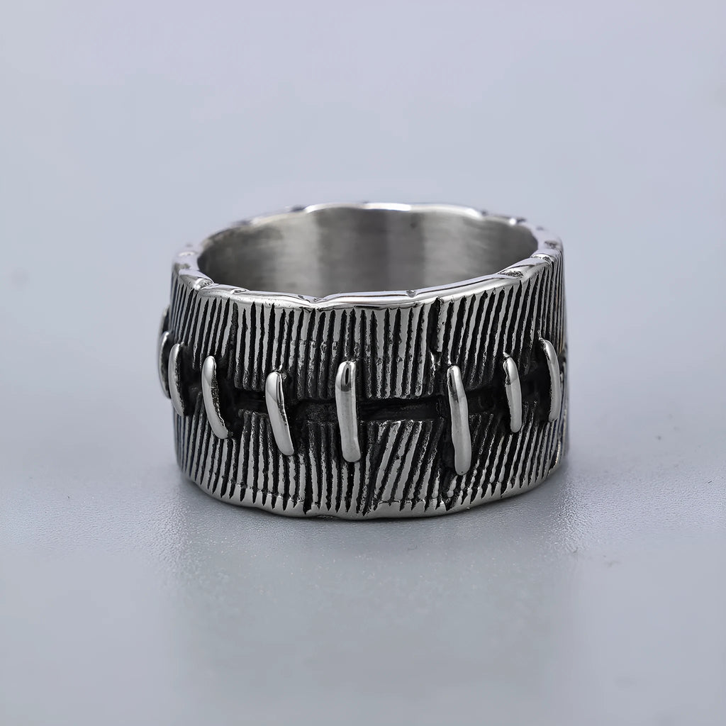 Geometric titanium steel double ring with stitched detail in dark retro colour