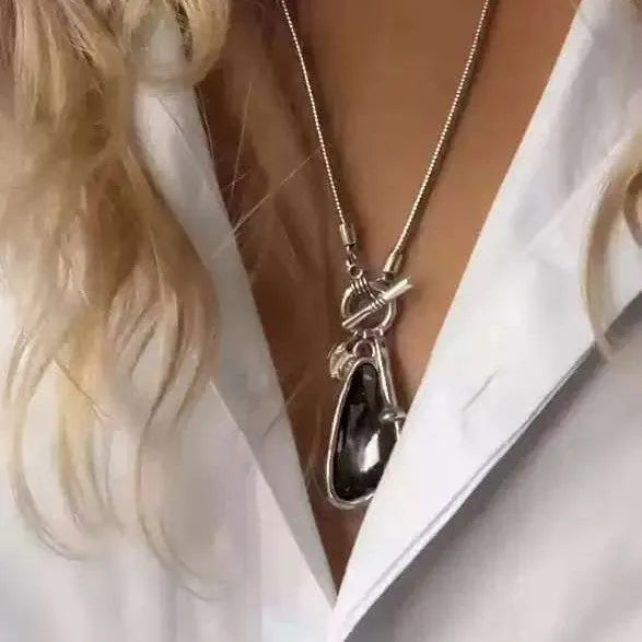Women's long geometric pendant necklace with snake bone chain in blue, champagne or grey colour