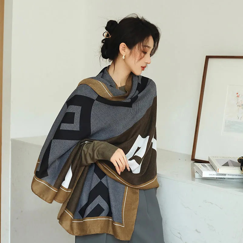 A woman wearing a printed polyester scarf, showing one of three style options, with dimensions of 180cm by 90cm.