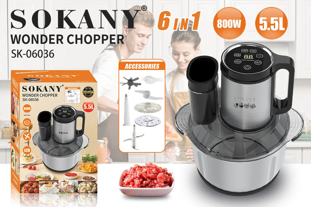 Stainless steel meat grinder and vegetable cutting machine on a kitchen counter