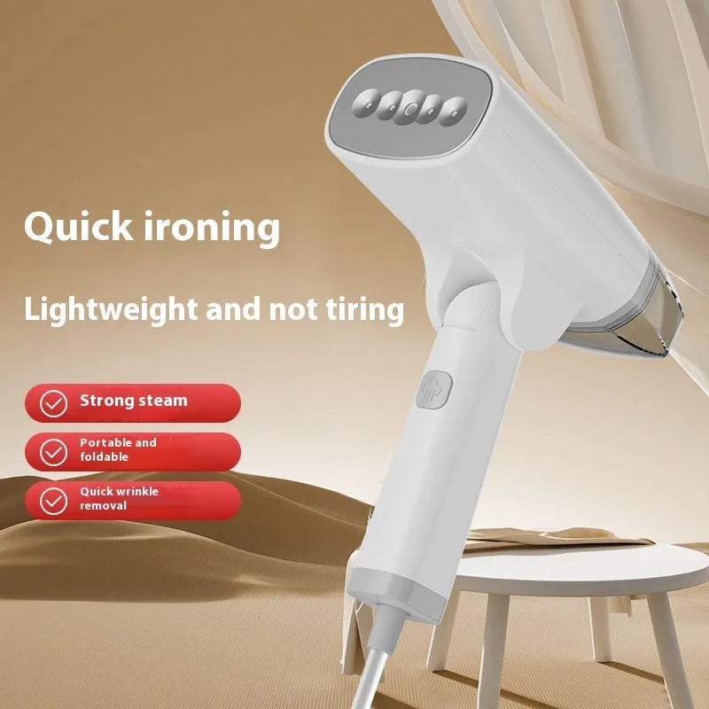 Blue and white handheld garment steamer with water tank and nozzle.