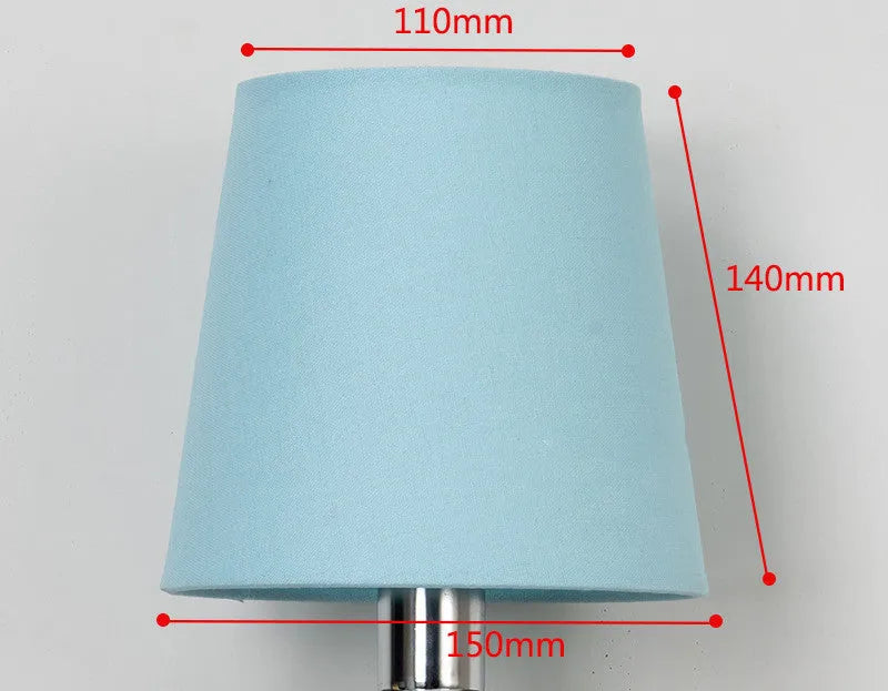Minimalist fabric lampshade in a choice of solid colours on a table lamp base.