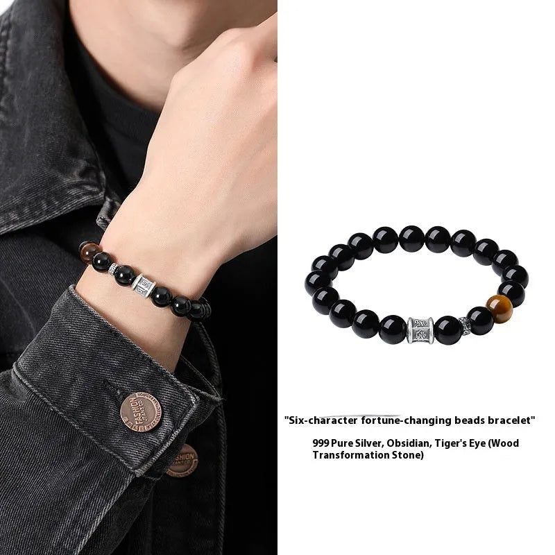 Men's hand-woven obsidian bracelet with 10mm beads, prayer wheel, and silver components