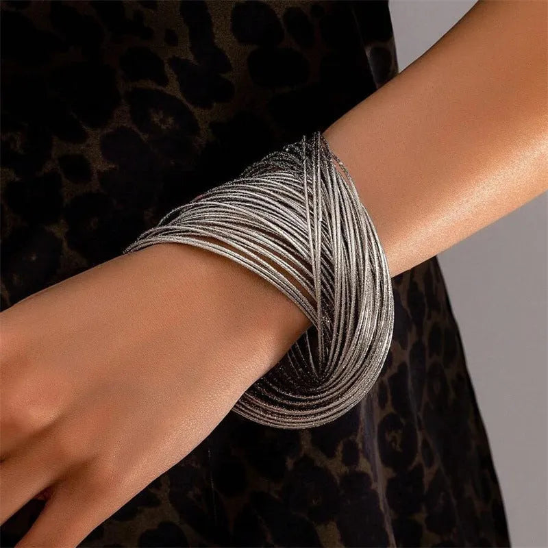 Irregular open cuff bracelet in electroplated zinc alloy with round ring and branch design, simple style