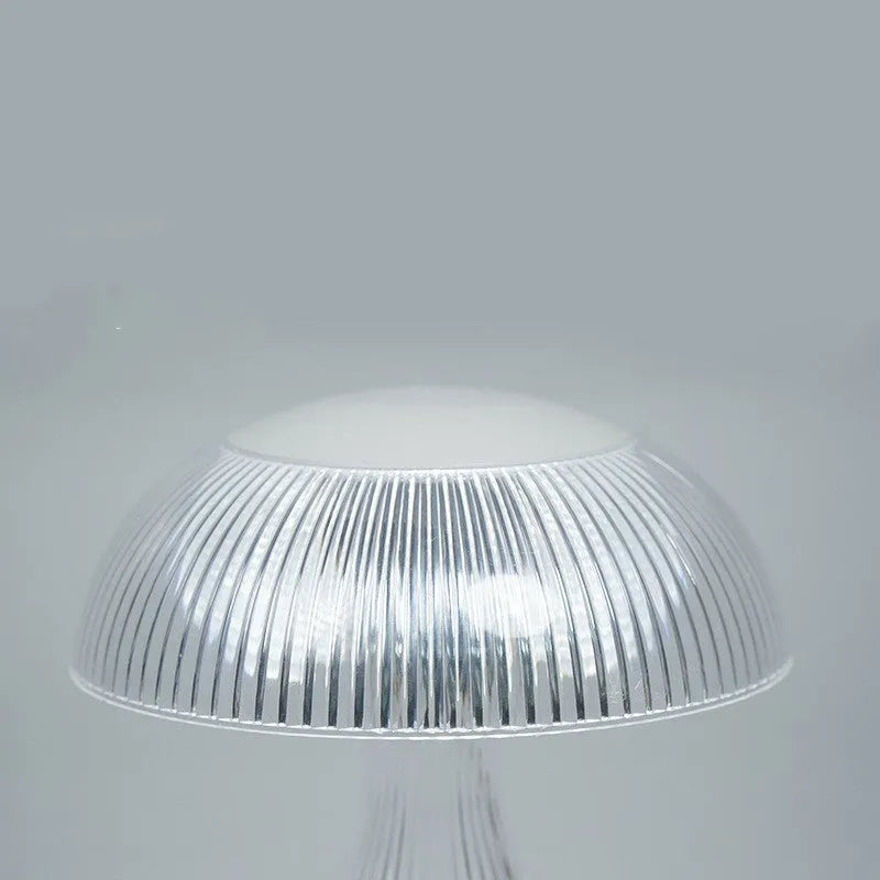 Small rechargeable touch night lamp with three-colour LED light measuring 20x16cm