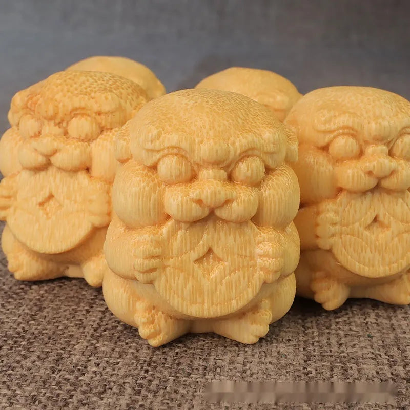 Solid bamboo carving ornament in traditional money shape measuring 4.5cm tall