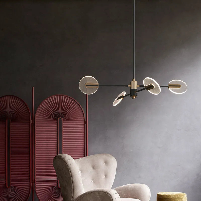 Nordic iron LED chandelier with multiple heads in acrylic detailing hanging from ceiling
