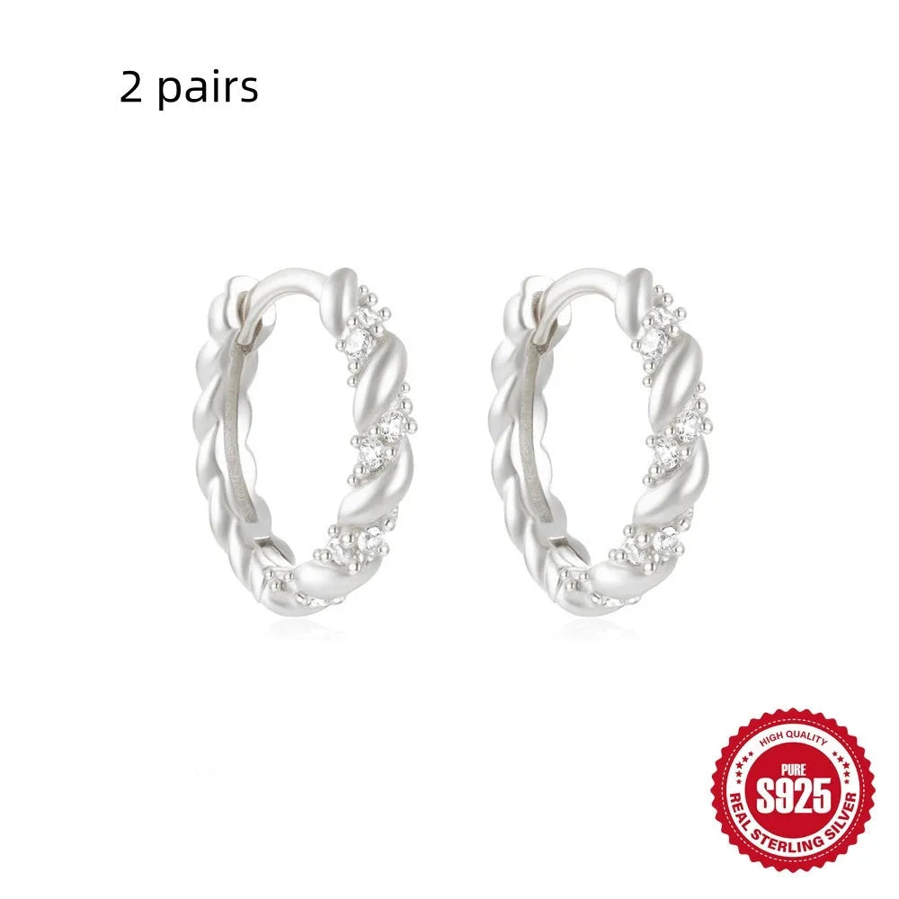 S925 sterling silver geometric stud earrings with electroplated gold or silver finish and circular design