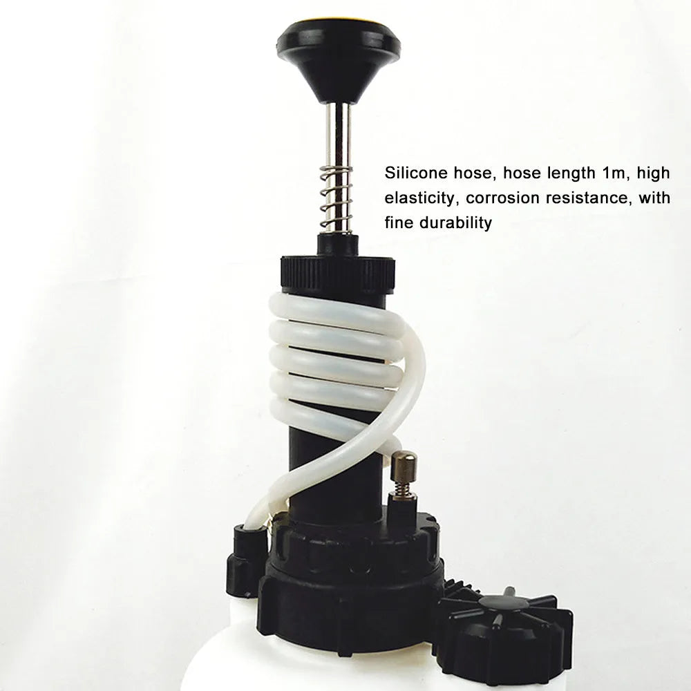 White plastic 3 litre brake oil tank replacement tool with copper piping