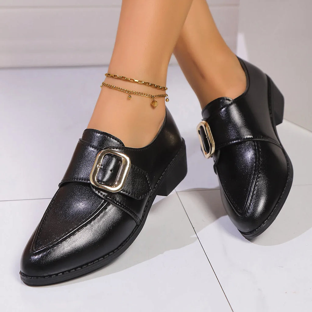 Women's British-style flat shoes with bow detail, pointed toe, and rubber sole