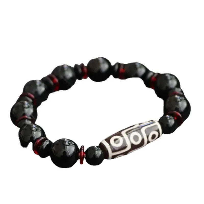 Black agate dzi bead bracelet with 11mm geometric beads in hand-woven unisex design