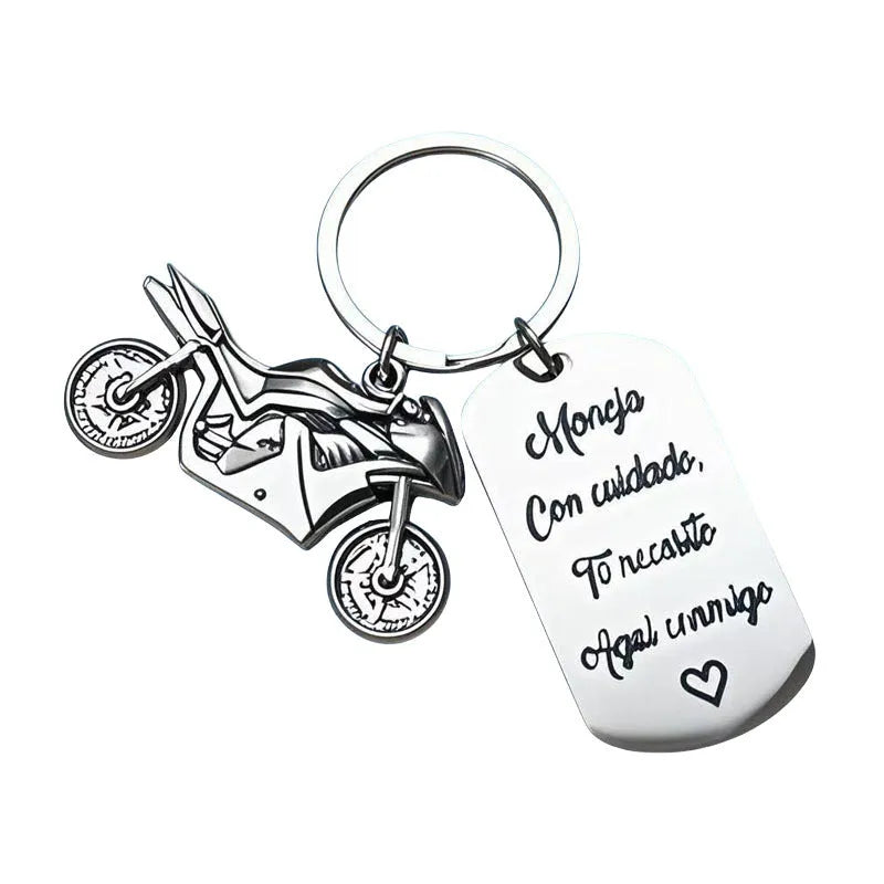 Stainless steel motorcycle keychain with inspirational engraving and a flannel storage bag.
