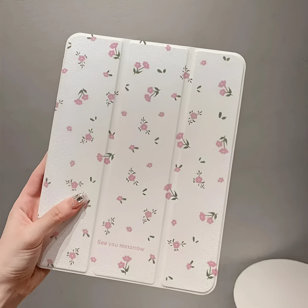 Transparent floral tri-fold iPad protective case showing magnetic stand function.