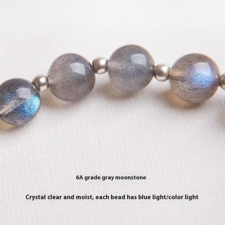 925 sterling silver honeysuckle bracelet with moonlight lime and strawberry crystals on wrist