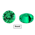 Synthetic Columbia green emerald gemstones in round and emerald cut shapes on white background