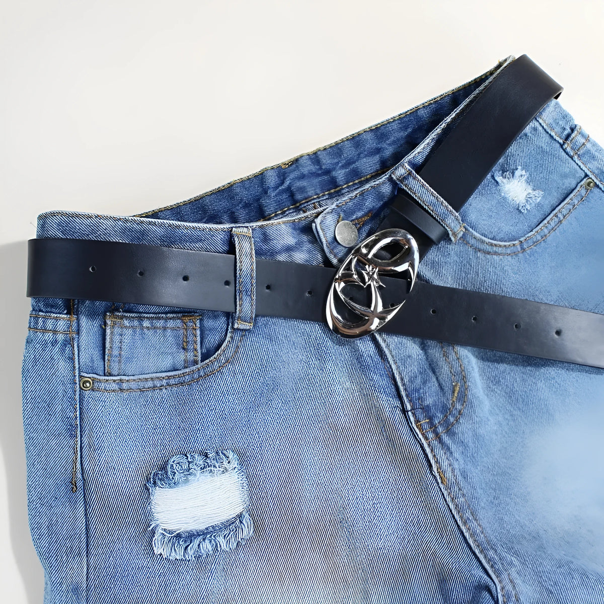 Silver buckle casual belt showing 105cm length and 3.3cm width with snap button closure