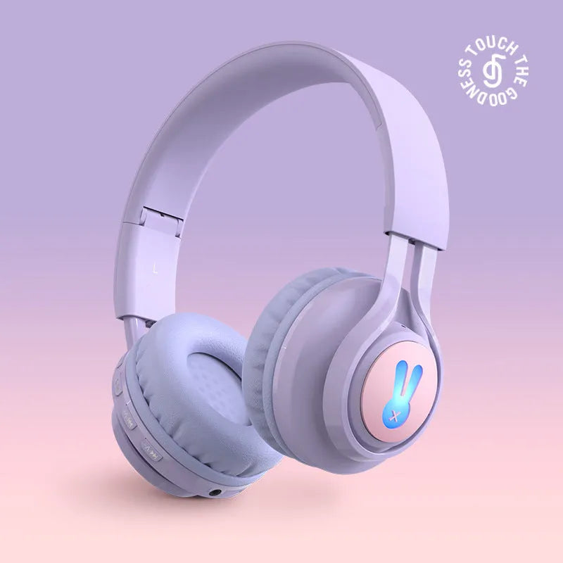 Children's wireless headphones with RGB LED lights in bunny pink colour showing Bluetooth connectivity