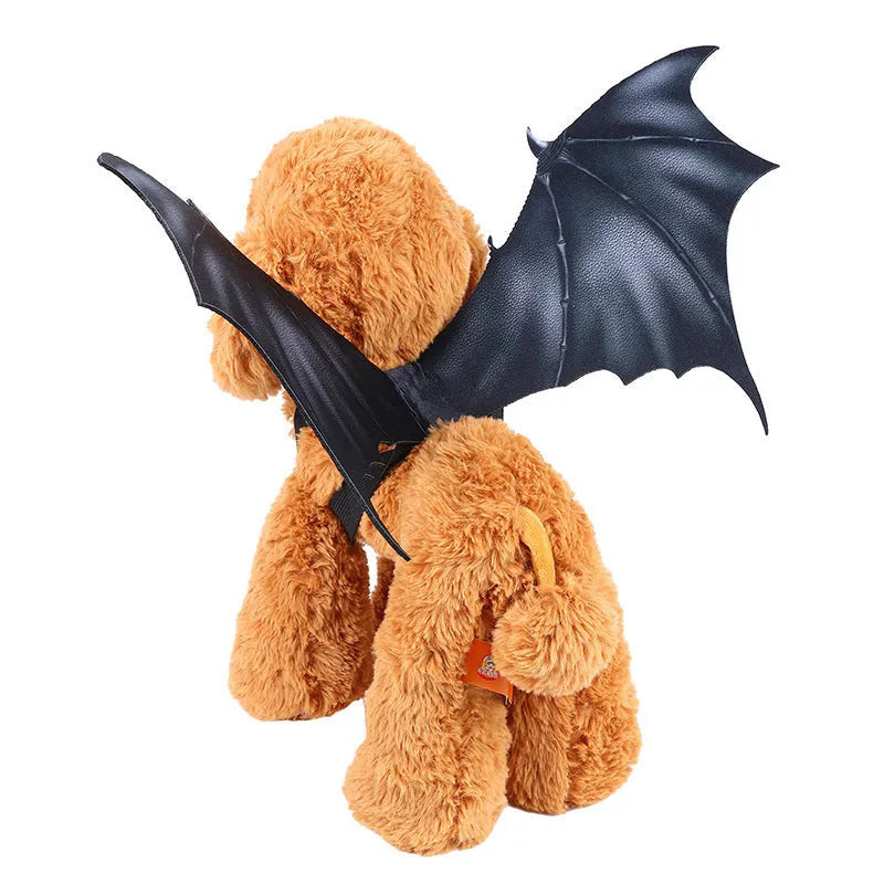 Black cloth bat wings costume for a dog or cat on a Halloween background