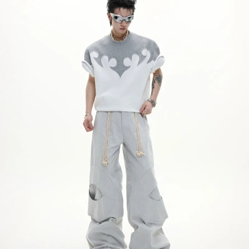 Men's loose grey cotton T-shirt with 3D stitching and rhinestone flower design on the front.
