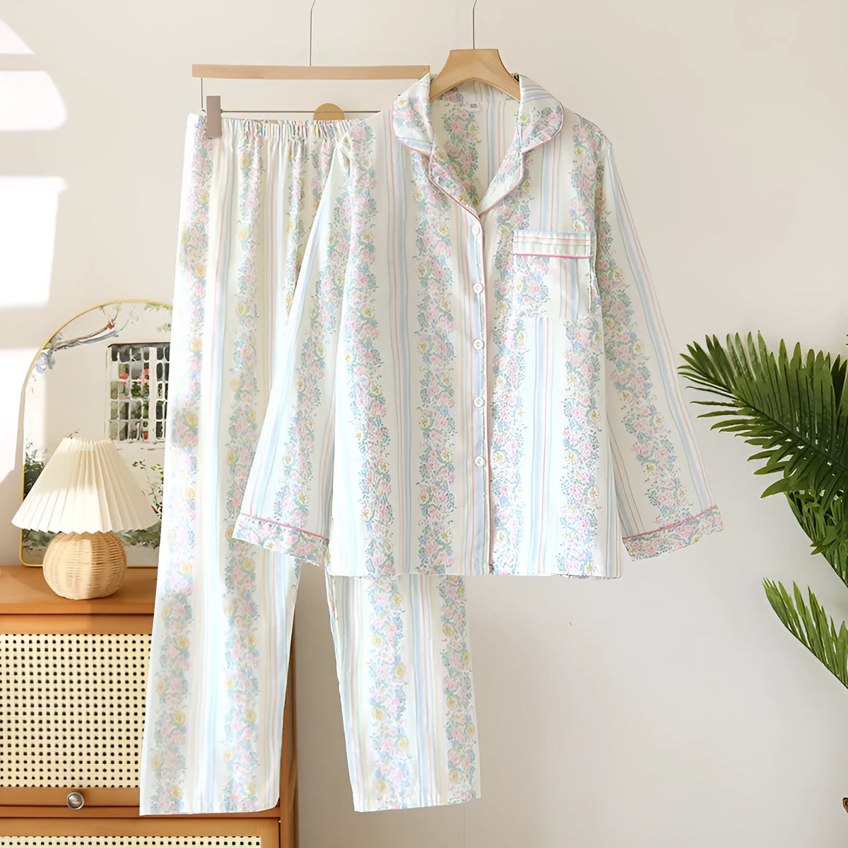 Women's cotton gauze long sleeve top and trousers homewear set in a stripes or fruit pattern.