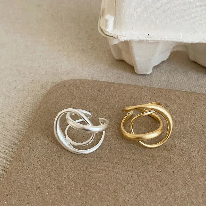 Women's geometric open ring with three-dimensional interlaced matte metal design