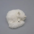 Artificial white fox fur car decoration ornament on car dashboard