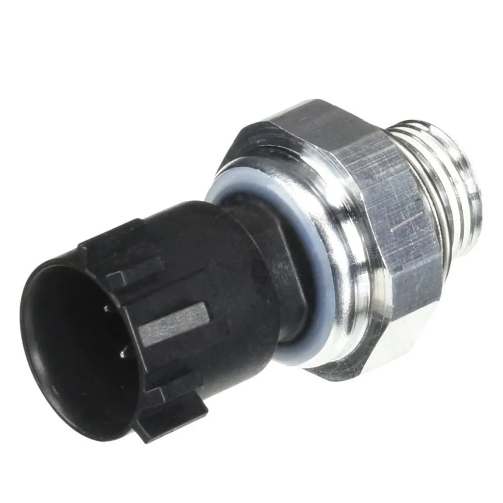 Silver automobile fuel pressure sensor for petrol engine diagnostic testing.