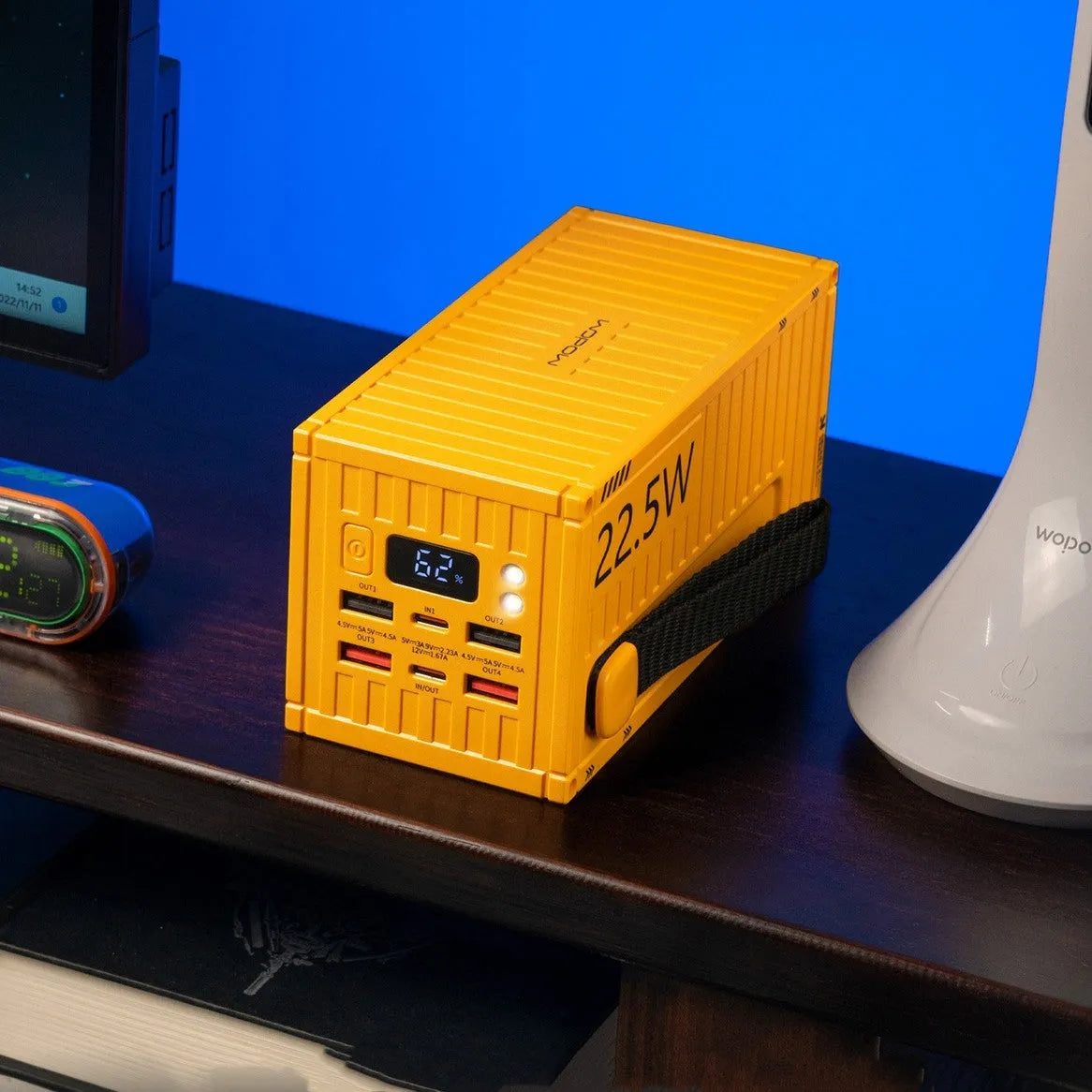 Yellow, black, and silver 50000mAh digital display power bank with five output ports