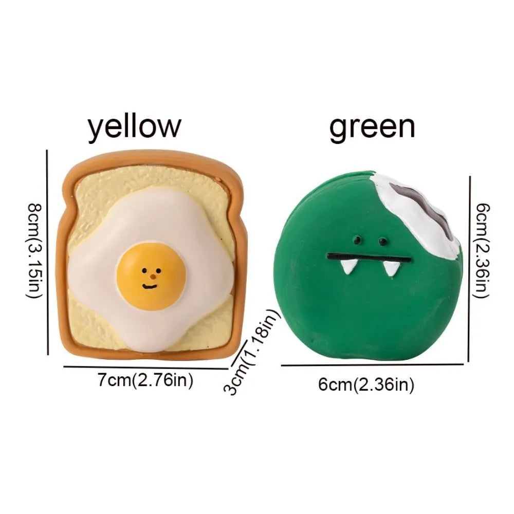 Yellow and green cartoon egg bread shaped latex squeaky toy for dogs on a white background.