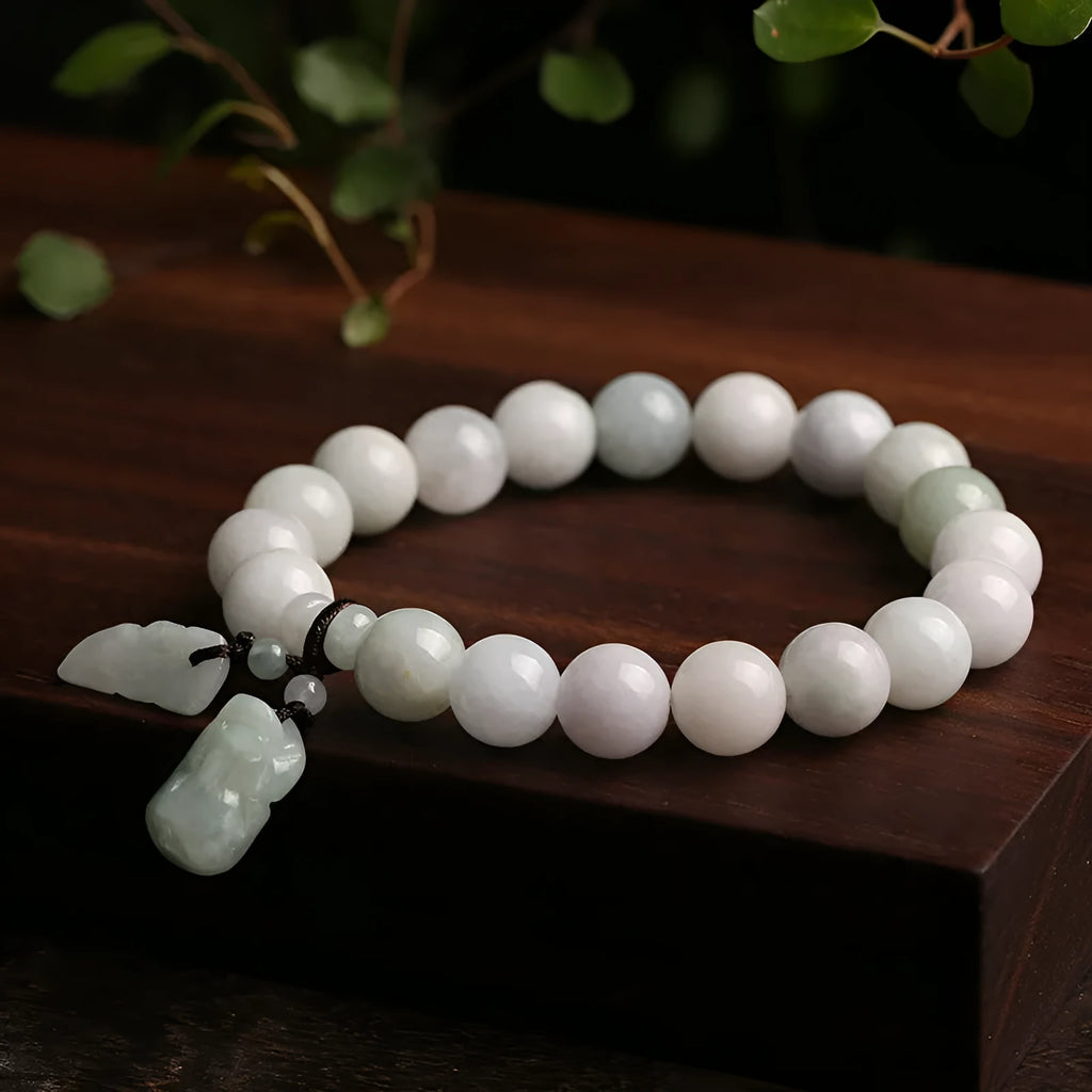 Natural jade bracelet with Maitreya Buddha charm and geometric design