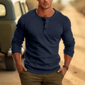 Men's long sleeve henry collar t-shirt in white, black, and navy blue on a size chart