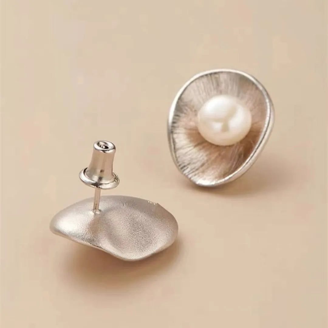 Gold coloured geometric pearl sterling silver needle ear studs for women.