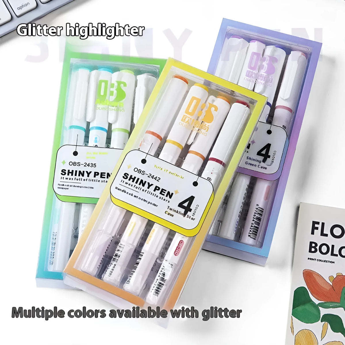 Set of four glitter highlighter pens with star river design and slanted tips in assorted colours.