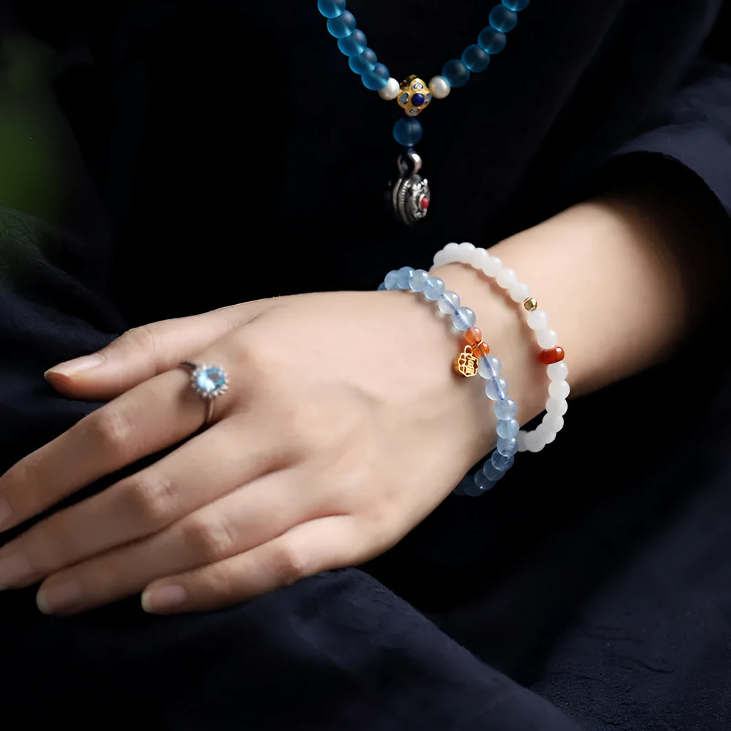 Ice translucent aquamarine crystal bracelet with 8mm round beads and sequin decoration