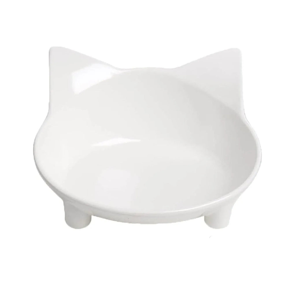 Set of four white shallow melamine pet bowls with black non-slip rubber bases on a table.