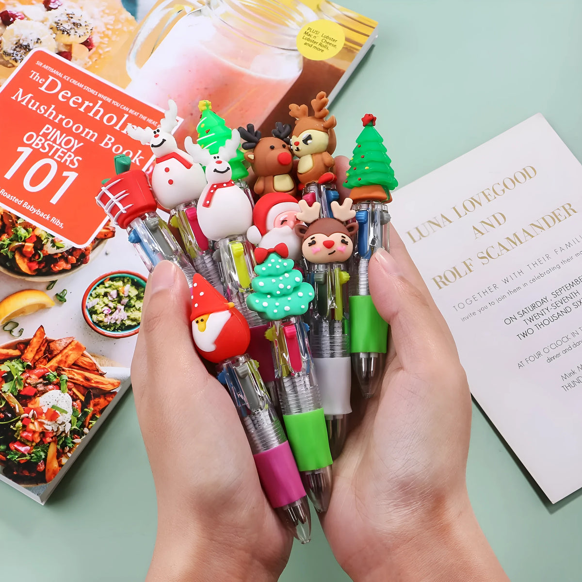 Christmas mini four-colour ballpoint pen with press mechanism showing festive designs