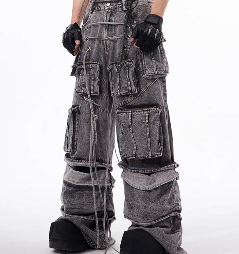 Grey distressed denim overalls for men with rope stitch detailing on the legs and chest.