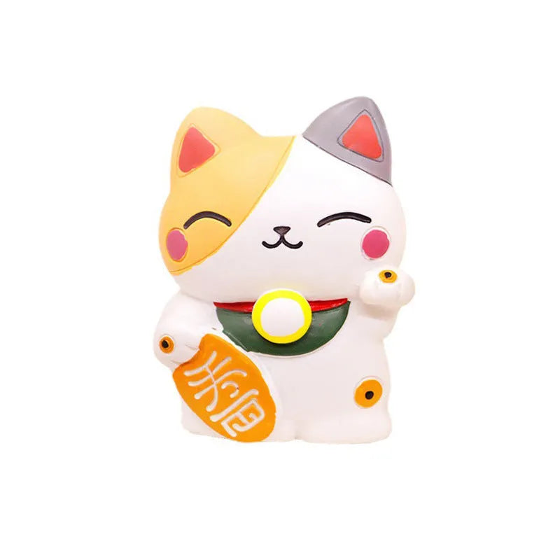 Resin fortune cat car vent aromatherapy clip in black or white.