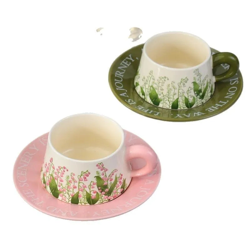 Ceramic coffee cup and saucer set with stirring spoons in Campanula or Lanling grass designs.