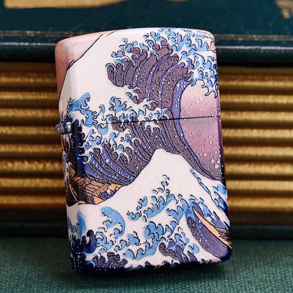 Coloured lacquer windproof lighter with Kanagawa surf design, steel inner liner, copper housing, 58 x 39 x 13mm.
