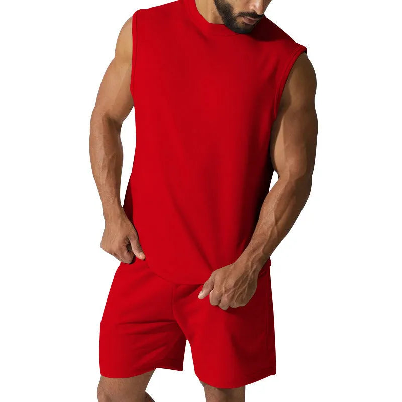 Men's sleeveless cotton blend sports top and matching shorts set in a solid colour.